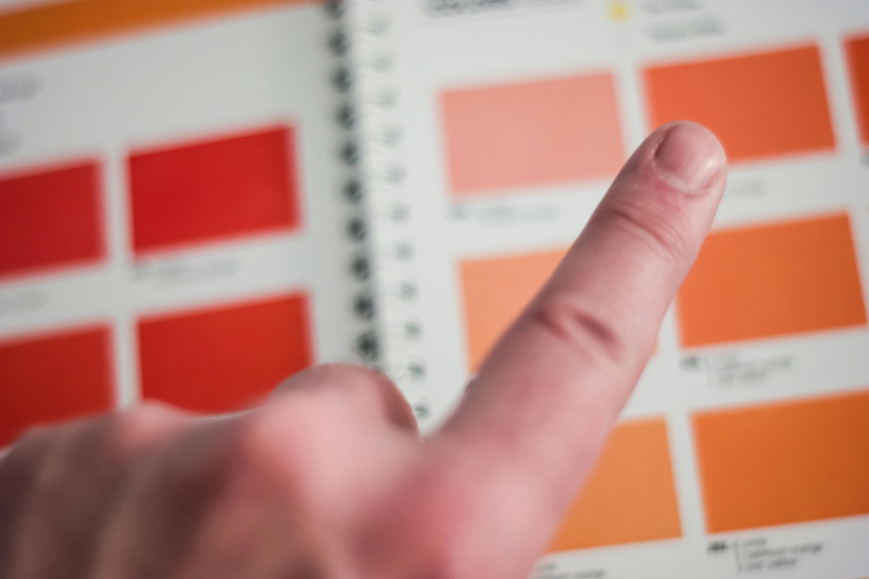 Choosing a color from a powder coating color swatch book