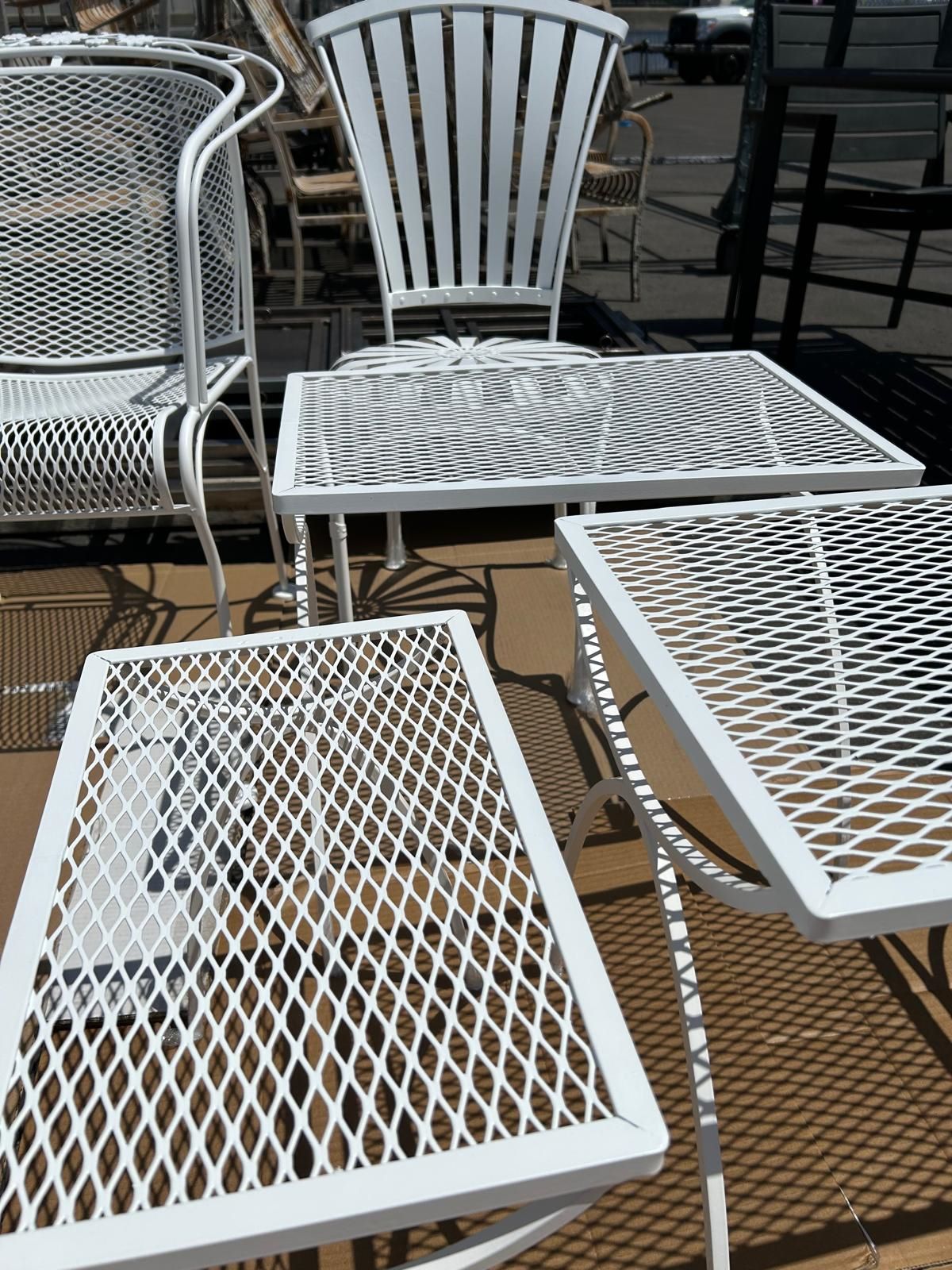 White powder coated wrought iron patio chairs and tables