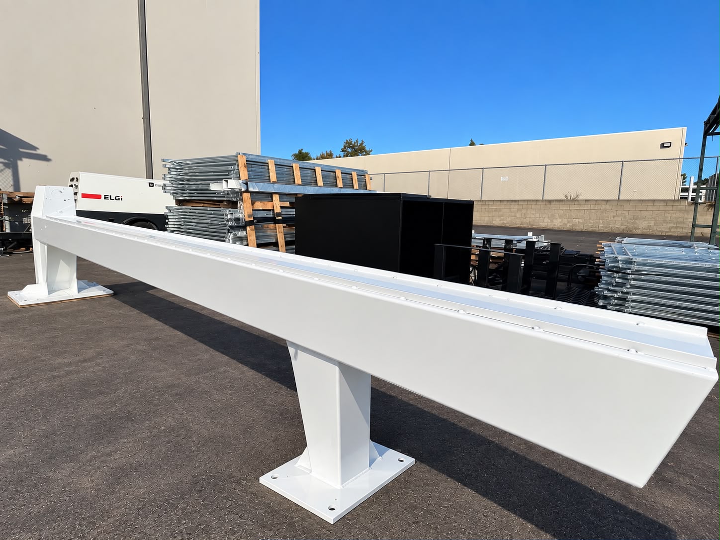 Long white powder coated industrial steel beam