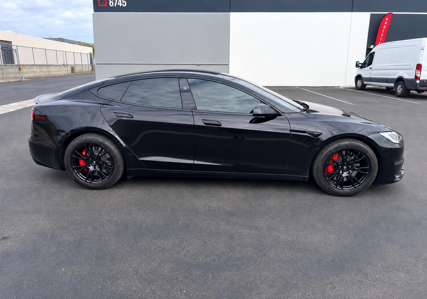Tesla powder coated gloss black rims